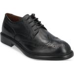 Svarta Brogue-skor i storlek 40 