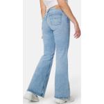 Low waisted jeans från Tommy Hilfiger med L32 med W28 i Denim för Damer 
