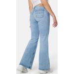 Low waisted jeans från Tommy Hilfiger med L34 med W28 i Denim för Damer 